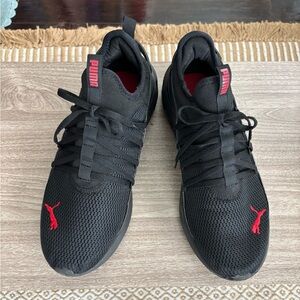 Men size 10 Puma Black Athletic Shoes with Red Accents